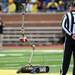 A robot delivers the game ball before the start of Michigan's spring practice at Michigan Stadium on Saturday, April 13, 2013. Melanie Maxwell I AnnArbor.com
